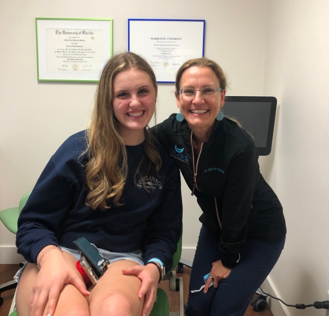 Dr. Nicole Mullally with Patient